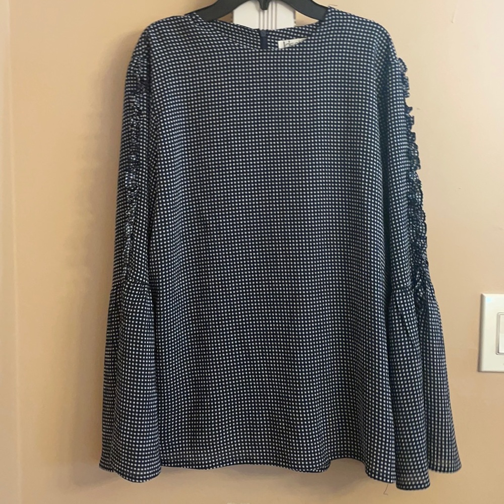Navy and white checkered with balloon sleeves ore owned great condition